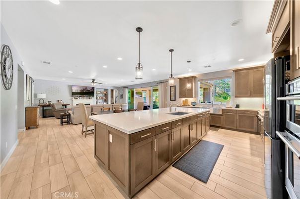 Dining room, Interior, Kitchen, Pendant Lights, Recessed Lighting, Stainless Steel Appliances, Wood Texture Flooring