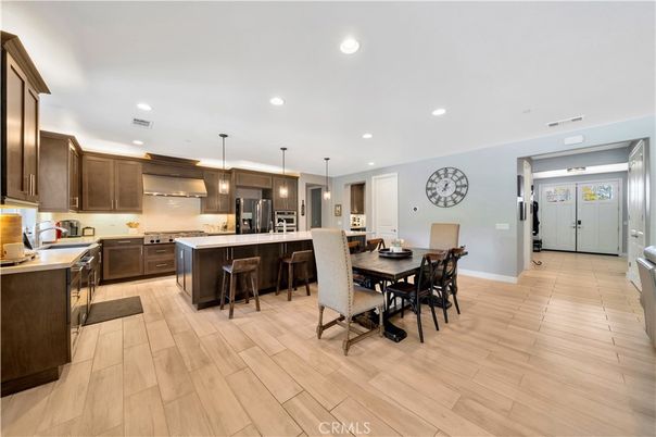 Dining room, Interior, Kitchen, Pendant Lights, Recessed Lighting, Stainless Steel Appliances, Wood Texture Flooring