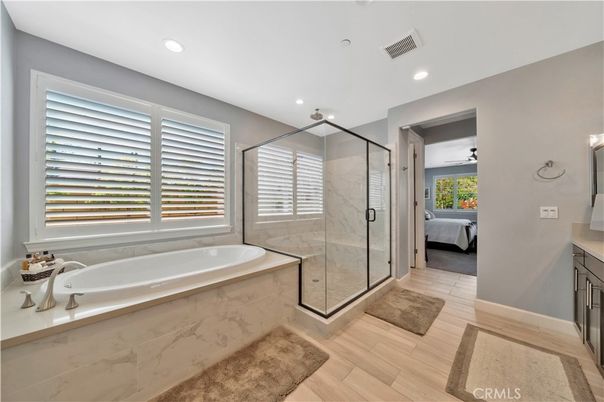 Bathroom, Bedroom, Glass Shower, Interior, Recessed Lighting, Wood Texture Flooring