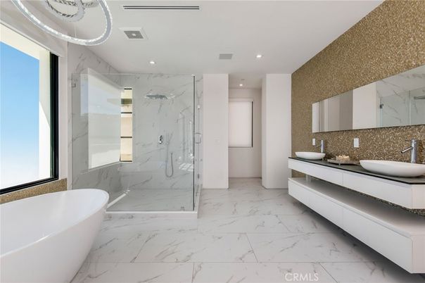 Bathroom, Dual Sink Vanities, Free Standing Baths, Glass Shower, Interior, Marble, Marble Walls, Recessed Lighting
