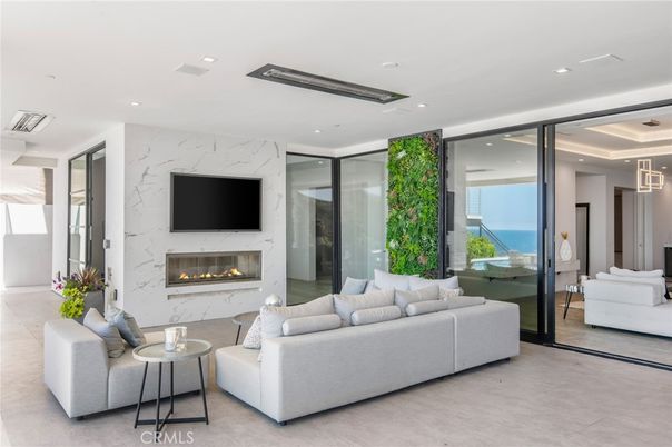 Fireplace, Interior, Living room, Marble Walls, Recessed Lighting, Water