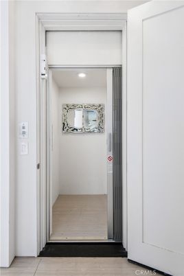 Elevator, Interior, Recessed Lighting, Wood Texture Flooring