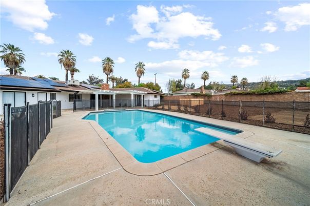 Exterior, Pool, Solar Panels