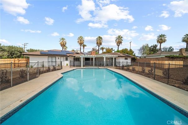 Exterior, Pool, Solar Panels
