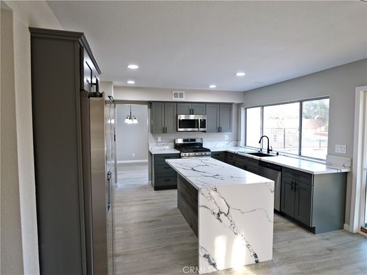 Interior, Kitchen, Pendant Lights, Recessed Lighting, Stainless Steel Appliances, Wood Texture Flooring