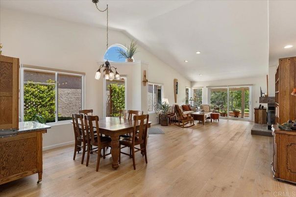 Dining room, Fireplace, Interior, Living room, Pendant Lights, Recessed Lighting, Wood Texture Flooring