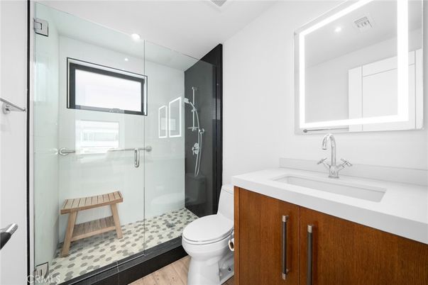 Bathroom, Glass Shower, Interior, Recessed Lighting, Wood Texture Flooring