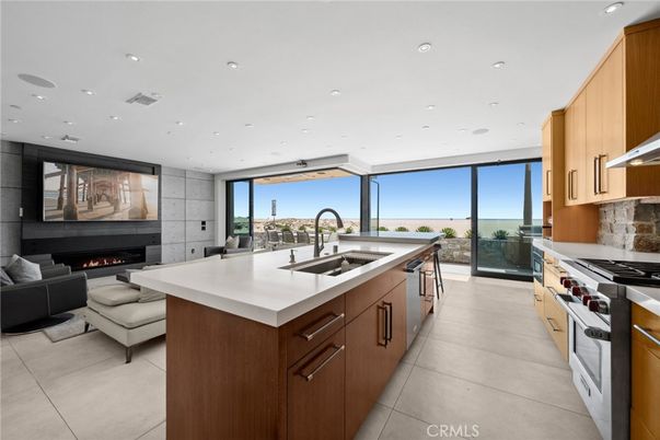 Fireplace, Interior, Kitchen, Living room, Recessed Lighting, Stainless Steel Appliances, Water