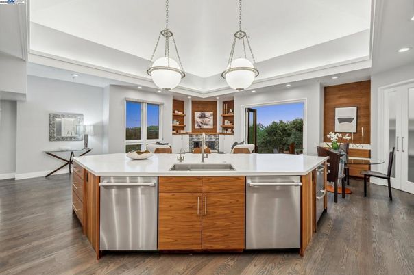 Dining room, Interior, Kitchen, Pendant Lights, Recessed Lighting, Stainless Steel Appliances, Wood Texture Flooring