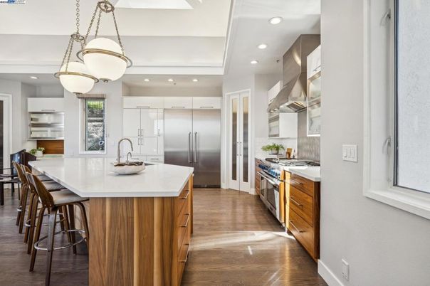 Interior, Kitchen, Pendant Lights, Recessed Lighting, Stainless Steel Appliances, Wood Texture Flooring