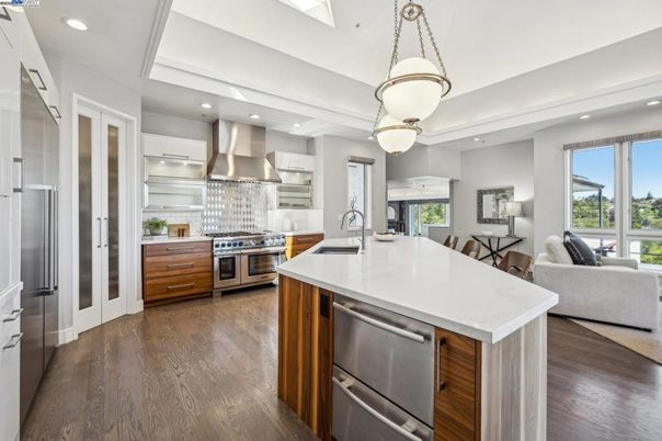 Dining room, Interior, Kitchen, Living room, Pendant Lights, Recessed Lighting, Stainless Steel Appliances, Wood Texture Flooring