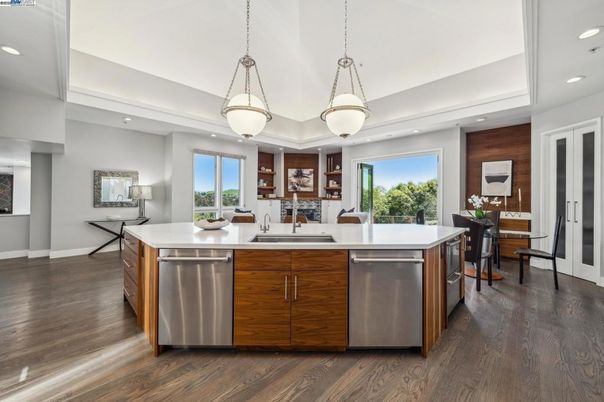 Dining room, Interior, Kitchen, Pendant Lights, Recessed Lighting, Stainless Steel Appliances, Wood Texture Flooring
