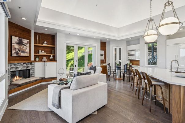 Dining room, Fireplace, Interior, Living room, Pendant Lights, Recessed Lighting, Wood Texture Flooring