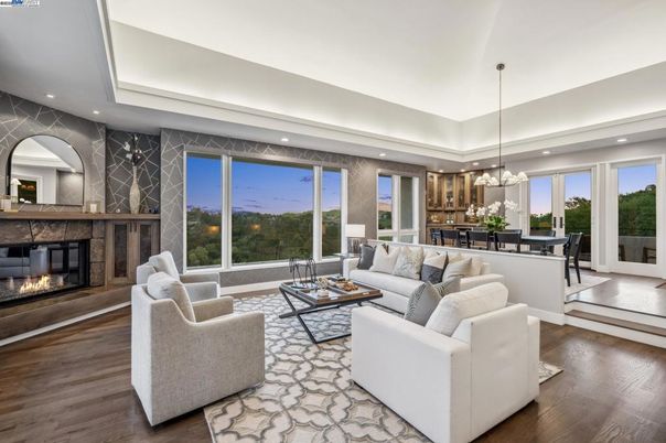 Dining room, Fireplace, Interior, Living room, Pendant Lights, Recessed Lighting, Wood Texture Flooring