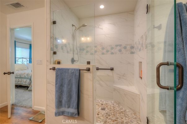 Bathroom, Glass Shower, Interior, Marble Walls, Recessed Lighting, Wood Texture Flooring