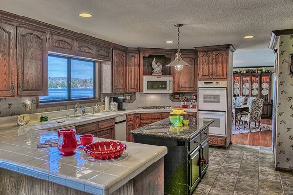 Dining room, Interior, Kitchen, Pendant Lights, Recessed Lighting, Stainless Steel Appliances, Tile Countertops