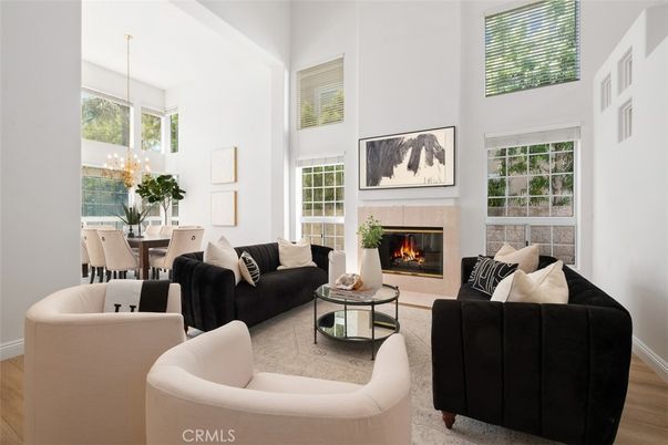 Chandelier, Dining room, Fireplace, Interior, Living room, Pendant Lights, Wood Texture Flooring