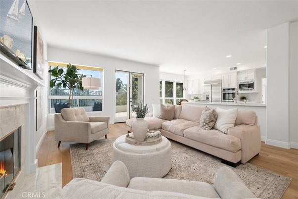 Fireplace, Interior, Kitchen, Living room, Pendant Lights, Recessed Lighting, Stainless Steel Appliances, Wood Texture Flooring