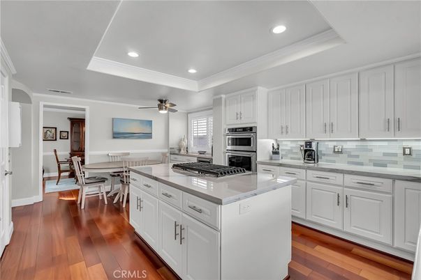Dining room, Interior, Kitchen, Recessed Lighting, Stainless Steel Appliances, Wood Texture Flooring