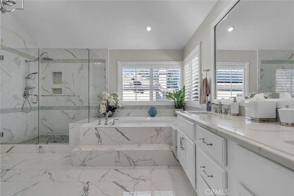 Bathroom, Dual Sink Vanities, Glass Shower, Interior, Marble, Marble Walls, Recessed Lighting