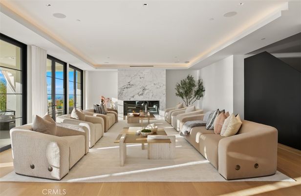 Fireplace, Interior, Living room, Marble Walls, Recessed Lighting, Wood Texture Flooring