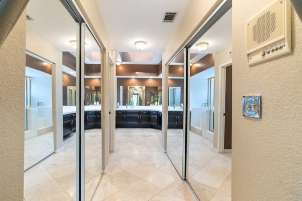 Bathroom, Dual Sink Vanities, Interior, Recessed Lighting, Tile Countertops