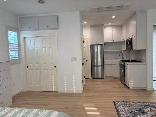 Interior, Kitchen, Recessed Lighting, Stainless Steel Appliances, Wood Texture Flooring