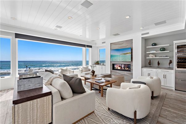 Fireplace, Interior, Living room, Recessed Lighting, Water, Wood Texture Flooring