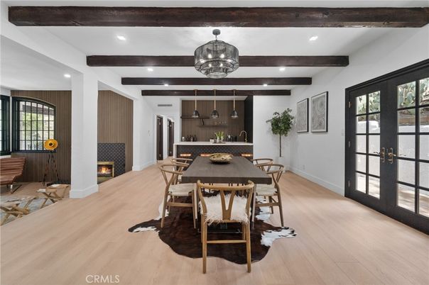 Dining room, Fireplace, Interior, Pendant Lights, Recessed Lighting, Wooden Beams, Wood Texture Flooring