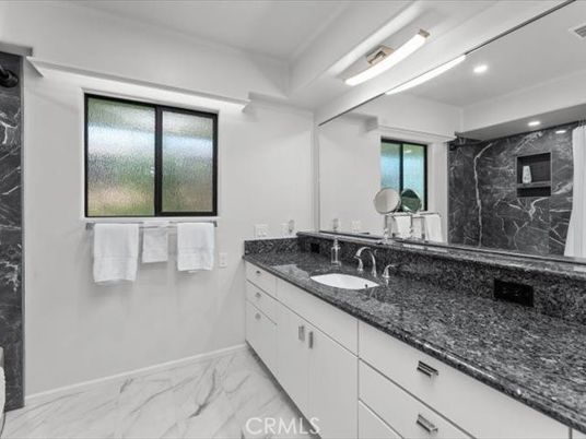 Bathroom, Dual Sink Vanities, Interior, Marble, Marble Walls, Recessed Lighting