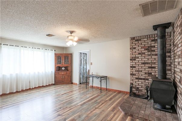 Empty room, Fireplace, Interior, Stone Walls, Wood Texture Flooring