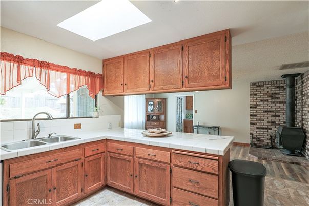 Interior, Kitchen, Tile Countertops, Wood Texture Flooring