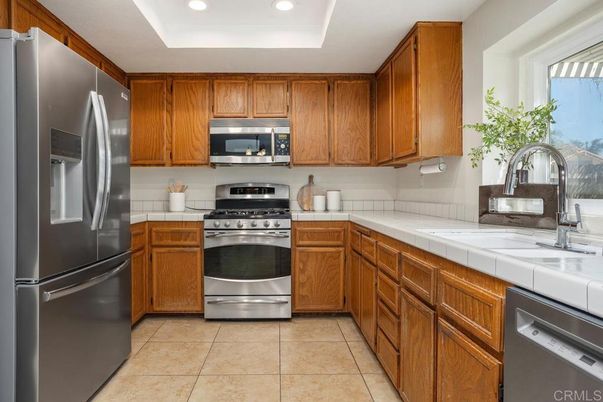 Interior, Kitchen, Recessed Lighting, Stainless Steel Appliances, Tile Countertops