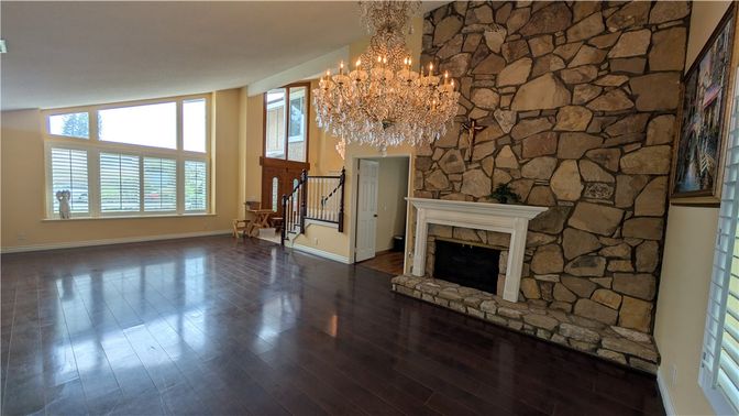 Chandelier, Empty room, Fireplace, Interior, Stone Walls, Wood Texture Flooring