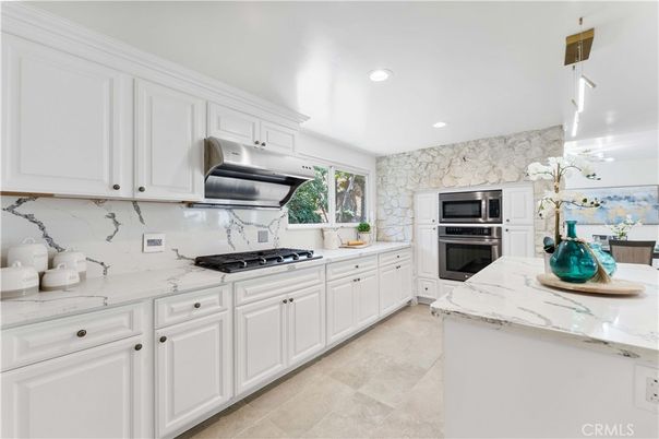 Interior, Kitchen, Recessed Lighting, Stainless Steel Appliances, Stone Walls