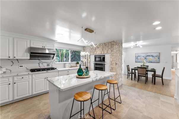 Dining room, Interior, Kitchen, Pendant Lights, Recessed Lighting, Stainless Steel Appliances, Stone Walls