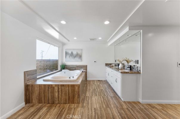 Bathroom, Dual Sink Vanities, Interior, Recessed Lighting, Wood Texture Flooring