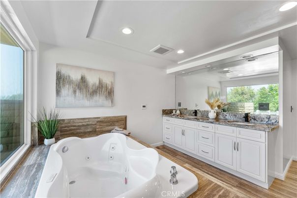 Bathroom, Dual Sink Vanities, Interior, Recessed Lighting, Wood Texture Flooring