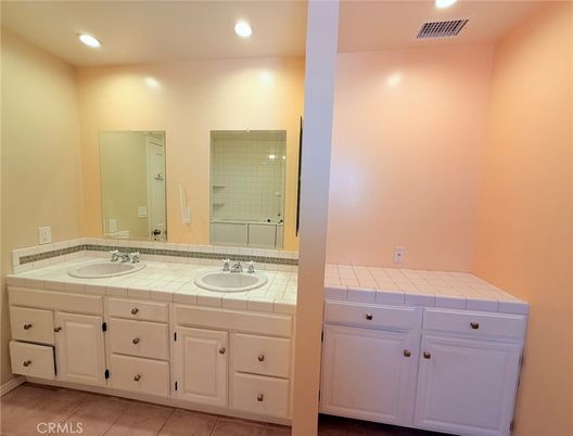 Bathroom, Dual Sink Vanities, Interior, Recessed Lighting, Tile Countertops