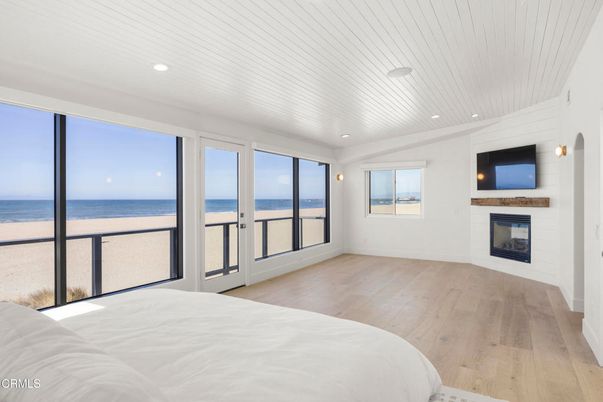 Bedroom, Fireplace, Interior, Recessed Lighting, Water, Wood Texture Flooring