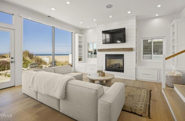 Fireplace, Interior, Living room, Recessed Lighting, Water, Wood Texture Flooring