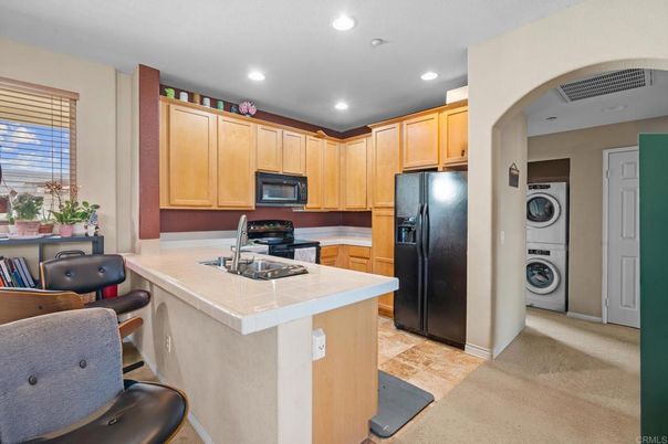 Interior, Kitchen, Recessed Lighting, Tile Countertops, Washer