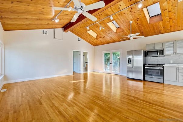 Empty room, Interior, Kitchen, Stainless Steel Appliances, Wooden Beams, Wooden Ceilings, Wood Texture Flooring