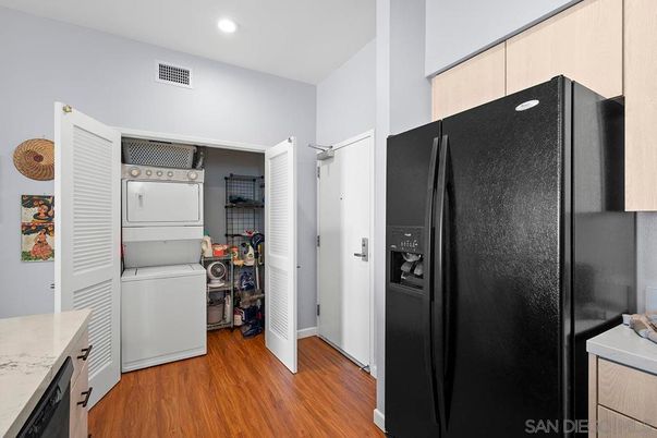 Interior, Kitchen, Recessed Lighting, Utility Closets, Washer, Wood Texture Flooring