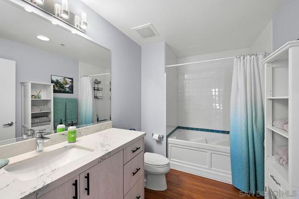Bathroom, Dual Sink Vanities, Interior, Recessed Lighting, Wood Texture Flooring