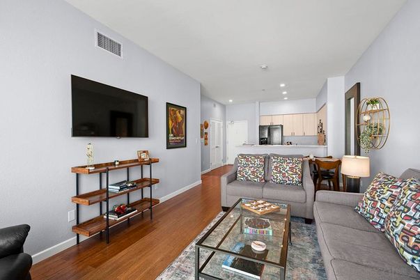 Dining room, Interior, Kitchen, Living room, Recessed Lighting, Stainless Steel Appliances, Wood Texture Flooring