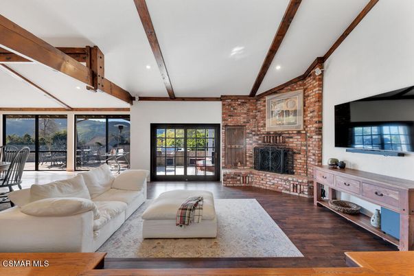 Fireplace, Interior, Living room, Recessed Lighting, Stone Walls, Wooden Beams, Wood Texture Flooring