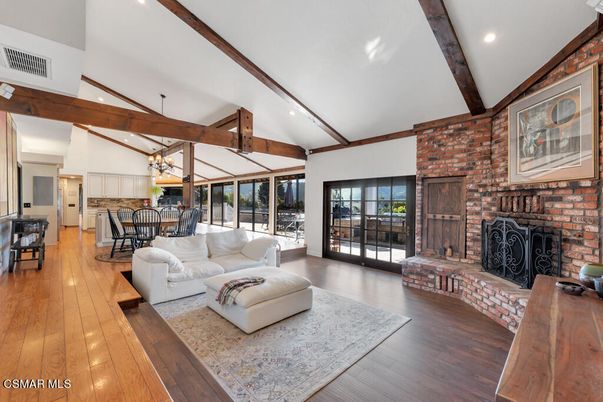 Dining room, Fireplace, Interior, Kitchen, Living room, Pendant Lights, Recessed Lighting, Stone Walls, Wooden Beams, Wood Texture Flooring