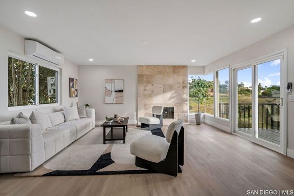 Fireplace, Interior, Living room, Recessed Lighting, Stone Walls, Wood Texture Flooring