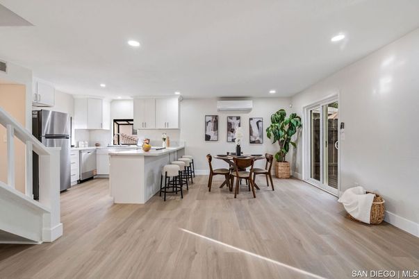 Dining room, Interior, Kitchen, Recessed Lighting, Stainless Steel Appliances, Wood Texture Flooring